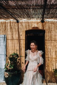 a beautiful bride with pleasant features in a wedding dress is photographed in Provence. Portrait of the bride in France.