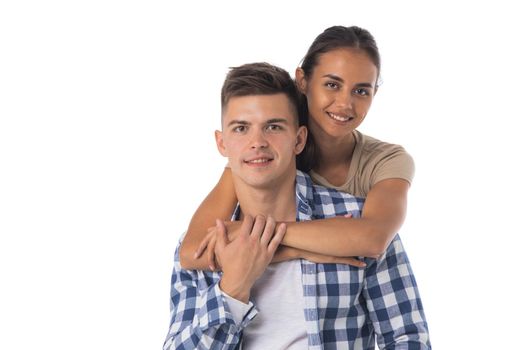 Portrait of a beautiful young happy smiling couple isolated on white background