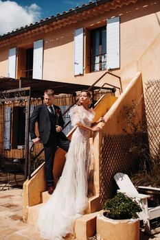 Wedding couple near a Villa in France.Wedding in Provence.Wedding photo shoot in France.