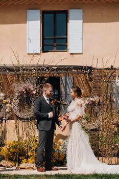 Wedding couple near a Villa in France.Wedding in Provence.Wedding photo shoot in France.