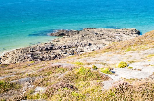 Landscape of the Brittany coast in the Cape Frehel region with its beaches, rocks and cliffs in summer.