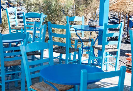 restaurant terrace in front of the beach in kamari on the island of santorini