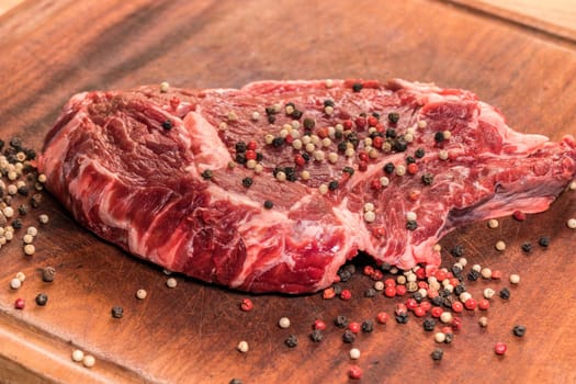 steak of beef on a wooden board