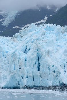 blue color of tidewater glacier in prince william sound in alaska