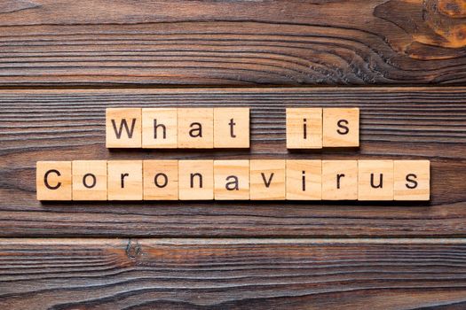 what is coronavirus word written on wood block. what is coronavirus text on wooden table for your desing, Wuhan, 2019-nCoV.concept top view.