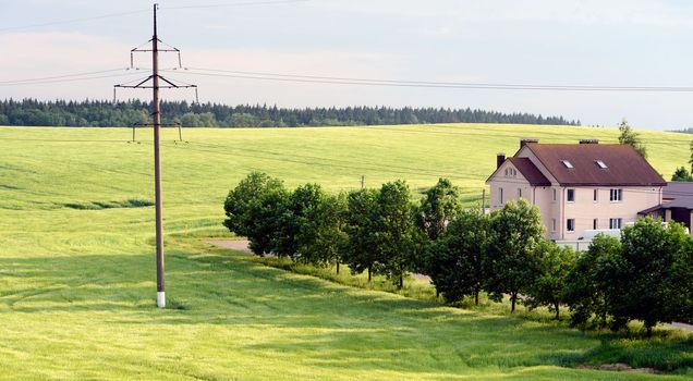 house on the edge of the field
