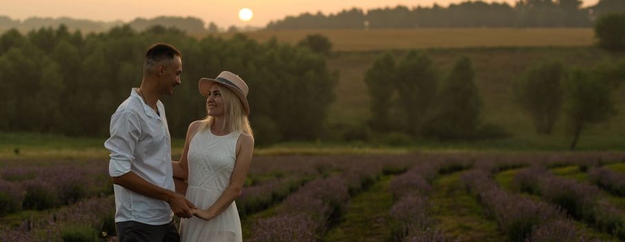 adult couple in the lavender fields.