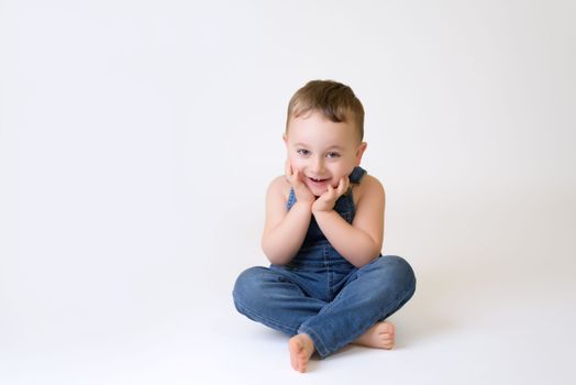 Happy child - isolated over a white background.