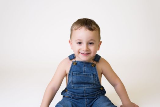 Happy child - isolated over a white background.