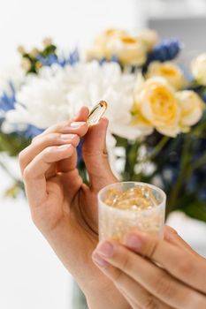 Omega 3 capsule of fish fat oil in hands close-up. BADS pills of biologically active dietary supplements. Vitamin D for building and maintaining healthy bones.