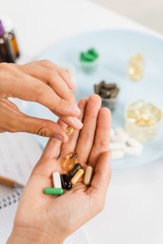Daily intake capsules of vitamins and BADS. Biologically active dietary supplements for healthcare. Pills and capsules of vitamins omega-3, d and collagen