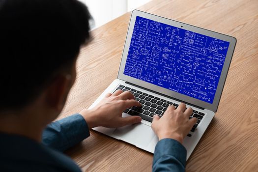 Mathematic equations and modish formula on computer screen showing concept of science and education