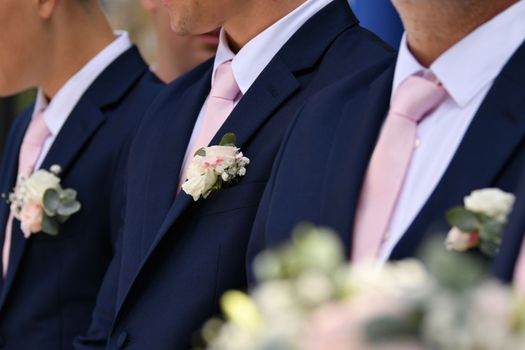 The groom's friends at the wedding dressed alike