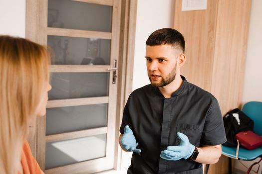 ENT doctor explain patient causes of difficulty breathing. Consultation of woman with otolaryngologist in a medical clinic