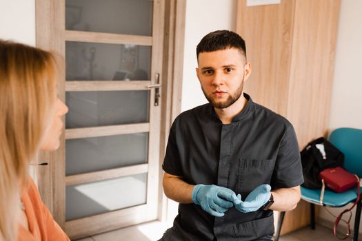 ENT doctor explain patient causes of difficulty breathing. Consultation of woman with otolaryngologist in a medical clinic