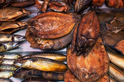 Various smoked fish products. Healthy eating and fish market concept