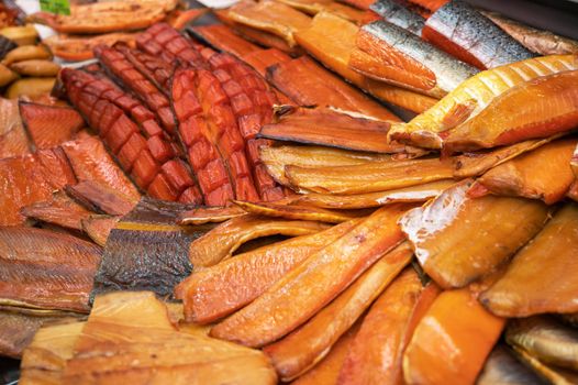 Various smoked fish products. Healthy eating and fish market concept