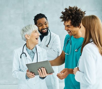 Portrait of a group of doctors at meeting in hospital