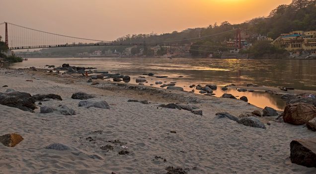 View at the river Ganges near Laksmanjhula in India at sunset