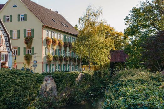 Old national German town house. Old Town is full of colorful and well preserved buildings. Baden-Wurttemberg is a state in southwest Germany bordering France and Switzerland. The Black Forest, known for its evergreen scenery and traditional villages, lies in the mountainous southwest. Stuttgart, the capital, is home to Wilhelma, a royal estate turned zoo and gardens. Porsche and Mercedes-Benz have headquarters and museums there. The 19th-century Hohenzollern Castle sits in the Swabian Alps to the south.