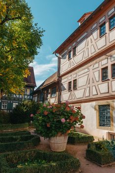 Old national German town house. Old Town is full of colorful and well preserved buildings. Baden-Wurttemberg is a state in southwest Germany bordering France and Switzerland. The Black Forest, known for its evergreen scenery and traditional villages, lies in the mountainous southwest. Stuttgart, the capital, is home to Wilhelma, a royal estate turned zoo and gardens. Porsche and Mercedes-Benz have headquarters and museums there. The 19th-century Hohenzollern Castle sits in the Swabian Alps to the south.