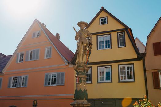 Old national German town house. Old Town is full of colorful and well preserved buildings. Baden-Wurttemberg is a state in southwest Germany bordering France and Switzerland. The Black Forest, known for its evergreen scenery and traditional villages, lies in the mountainous southwest. Stuttgart, the capital, is home to Wilhelma, a royal estate turned zoo and gardens. Porsche and Mercedes-Benz have headquarters and museums there. The 19th-century Hohenzollern Castle sits in the Swabian Alps to the south.