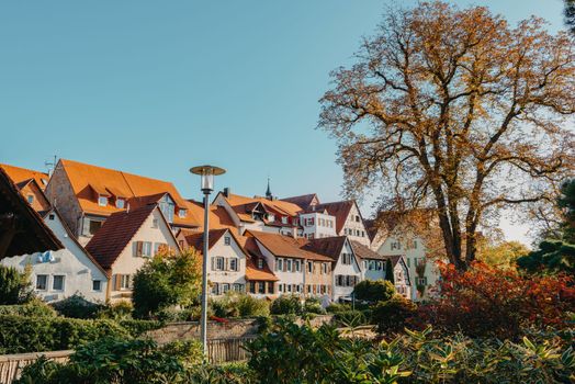 Old national German town house. Old Town is full of colorful and well preserved buildings. Baden-Wurttemberg is a state in southwest Germany bordering France and Switzerland. The Black Forest, known for its evergreen scenery and traditional villages, lies in the mountainous southwest. Stuttgart, the capital, is home to Wilhelma, a royal estate turned zoo and gardens. Porsche and Mercedes-Benz have headquarters and museums there. The 19th-century Hohenzollern Castle sits in the Swabian Alps to the south.