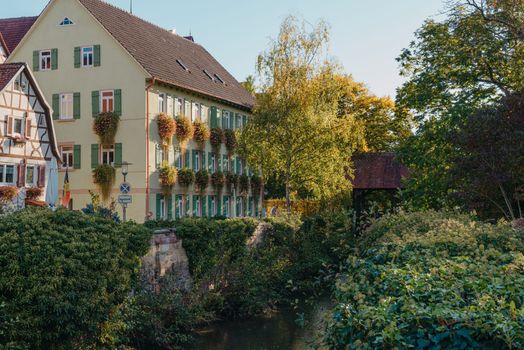 Old national German town house. Old Town is full of colorful and well preserved buildings. Baden-Wurttemberg is a state in southwest Germany bordering France and Switzerland. The Black Forest, known for its evergreen scenery and traditional villages, lies in the mountainous southwest. Stuttgart, the capital, is home to Wilhelma, a royal estate turned zoo and gardens. Porsche and Mercedes-Benz have headquarters and museums there. The 19th-century Hohenzollern Castle sits in the Swabian Alps to the south.