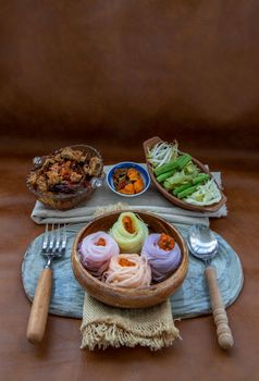 Rice noodles with spicy pork sauce or Nam ngiao Rice Noodle (Traditional Northern Thai Cuisine). Nam ngiao has a characteristic spicy and tangy flavor Served with vegetable. Thai spicy food.