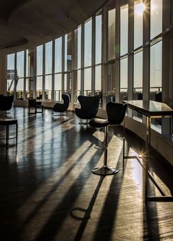 Bangkok, Thailand - Jan 10, 2022 : Common area of condominium in morning. New normal, The seats were set separately according to social distancing policy for the spread of covid-19 prevention, Selective focus.
