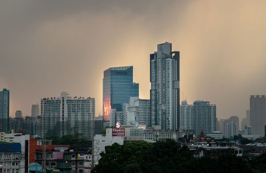 Bangkok, Thailand - May 09, 2021 : Aerial view of Beautiful scenery view of Skyscraper Evening time before Sunset creates relaxing feeling for the rest of the day. Selective focus.