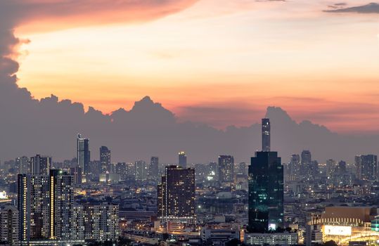 Bangkok, Thailand - May 09, 2021: Aerial view of Beautiful scenery view of Skyscraper Evening time Sunset creates relaxing feeling for the rest of the day. Selective focus.