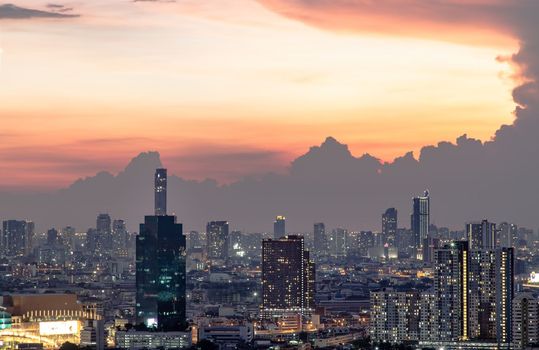 Bangkok, Thailand - May 09, 2021: Aerial view of Beautiful scenery view of Skyscraper Evening time Sunset creates relaxing feeling for the rest of the day. Selective focus.
