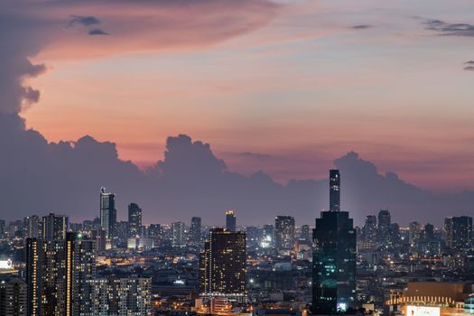 Bangkok, Thailand - May 09, 2021: Aerial view of Beautiful scenery view of Skyscraper Evening time Sunset creates relaxing feeling for the rest of the day. Selective focus.