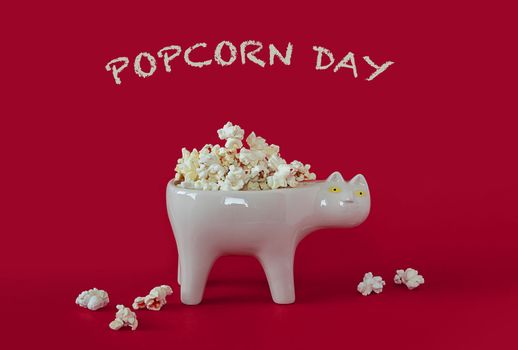 National popcorn day concept. Bowl full of popcorn. Leisure idea.