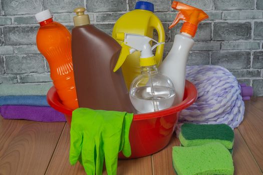 woman using cleaning products at home