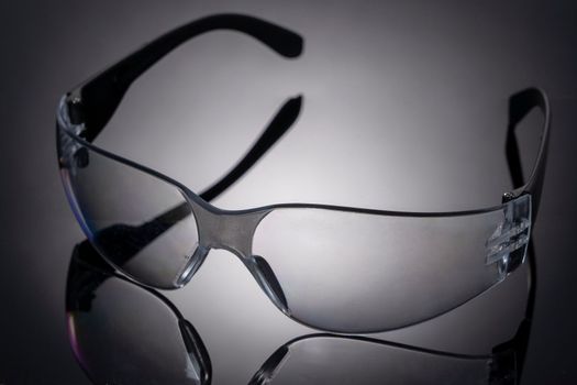 safety glasses. Black Plastic protective work glasses. Simple modern safety glasses. High quality photo