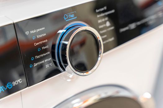 Sosnovy Bor, RUSSIA - JANUARY 12, 2023: household appliances in DNS store, washing machines. High quality photo