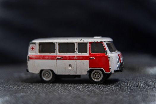 modelka toy car ambulance. Medical transport vehicle. red cross. Ambulance model.