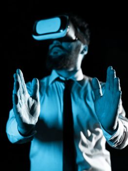 Man Wearing Vr Glasses And Presenting Important Messages Between Hands.