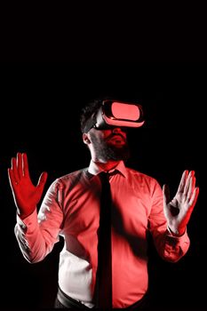 Man Wearing Vr Glasses And Presenting Important Messages Between Hands.