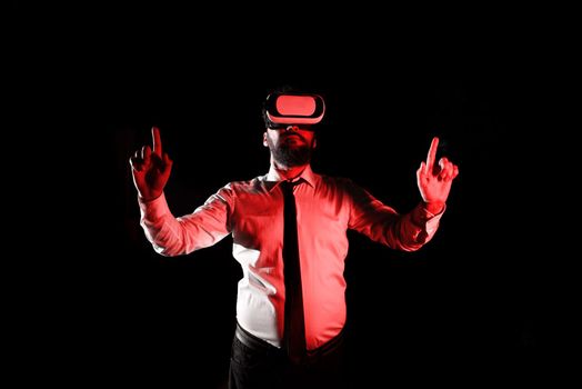 Man Wearing Vr Glasses And Pointing On Important Messages With two Fingers.