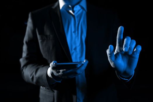 Man Holding Mobile Phone and Point On Recent Updates With One Finger.