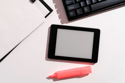 Tablet Screen With Important Ideas On It And Note Sticked on Desk