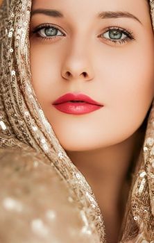 Beauty, luxury fashion and glamour, woman dressed in gold, portrait