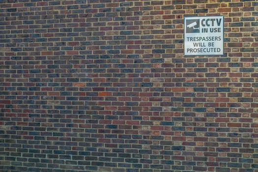 Walls with signs indicating the control area of the CCTV security system Suitable for background images