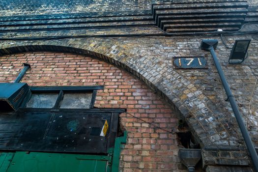London, UK- Feb 24, 2019 : Warehouse under the bridge in London