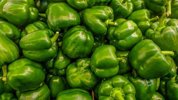 Picture of sweet green pepper (green Capsicum) In the market.