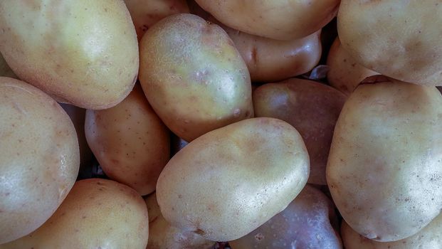 Potatoes For Sale At Fruit And Vegetable Market Suitable for making background images.