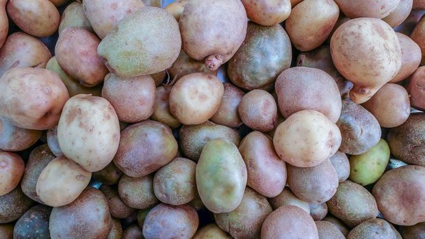 Potatoes For Sale At Fruit And Vegetable Market Suitable for making background images.